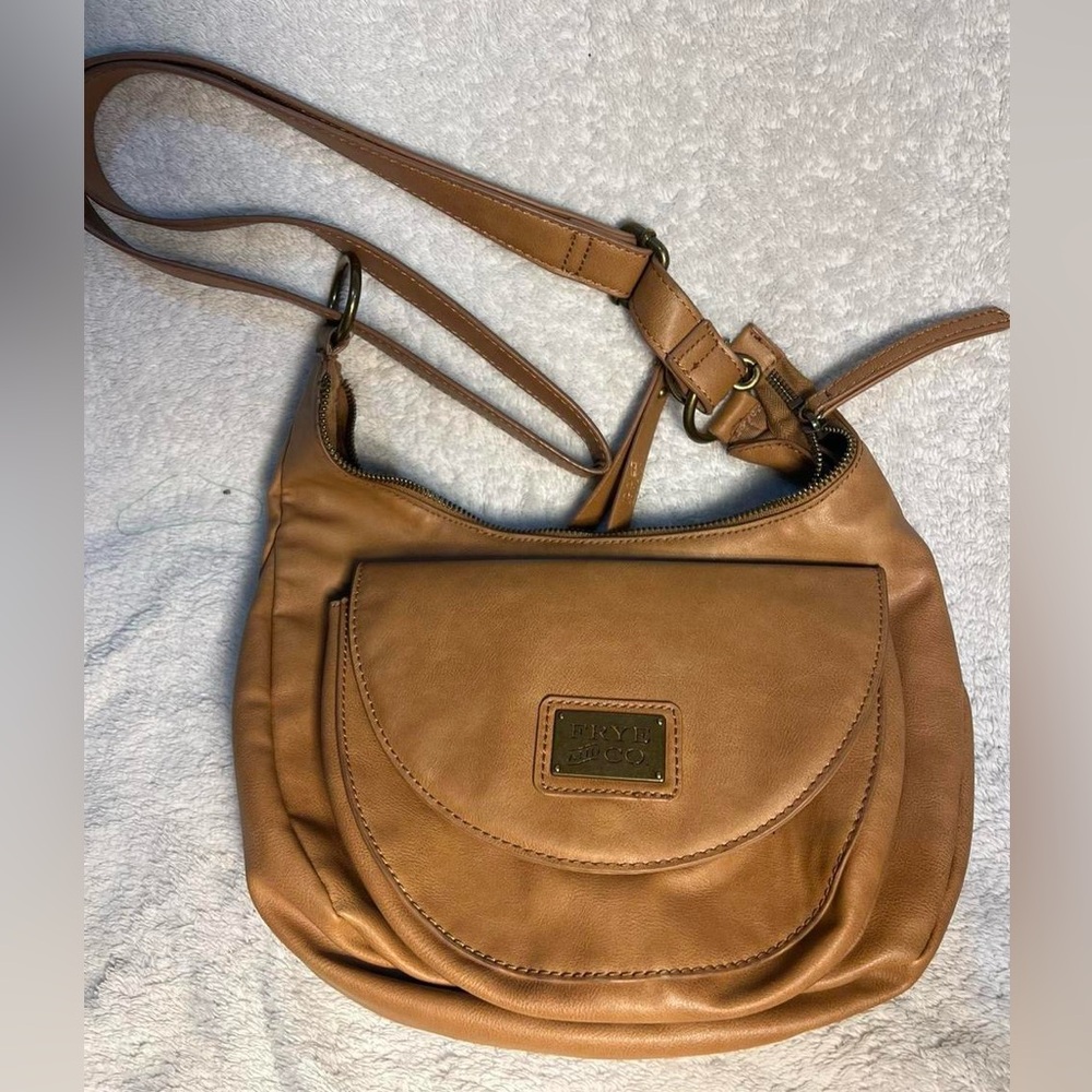 Frye & Co tan faux leather saddle bag with adjustable strap